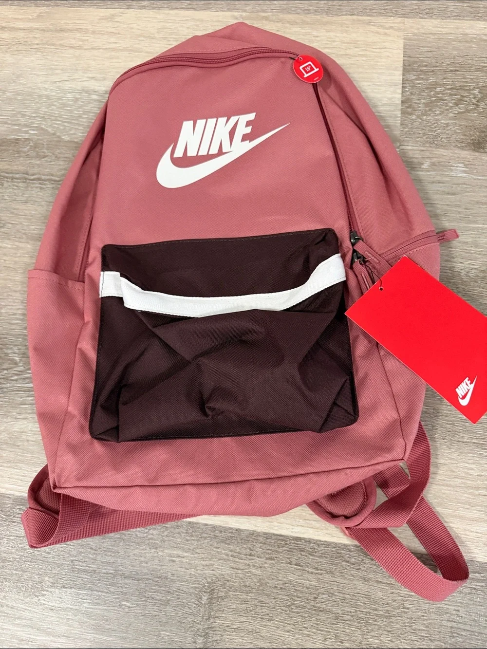 Nike Rose Pink Backpack with Dark Brown Front Pocket and White Logo